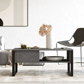 Vue latérale de la table basse “VALENCE” bois gris et acier noir 100x60 cm, avec espace de rangement intégré, plateau robuste en MDF 18 mm.